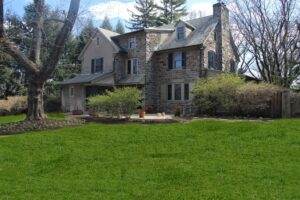 Spring yard clean up removes debris and trims overgrown plants